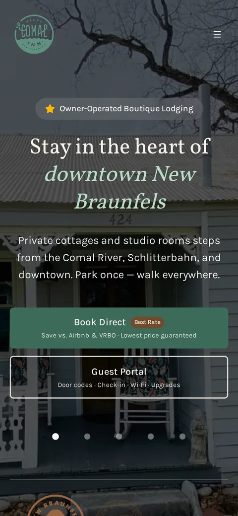 The Comal Inn homepage on a phone, with the Book Direct button near the top